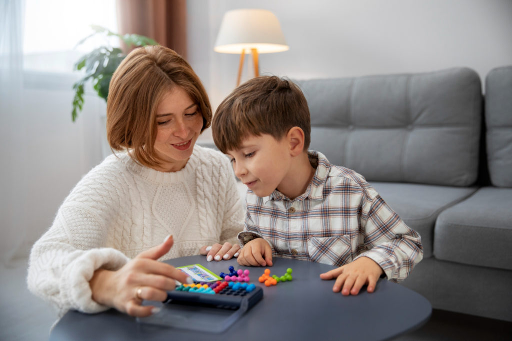 A child playing with his mother